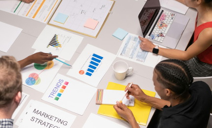 Creative branding team discussing brand identity strategy for business growth