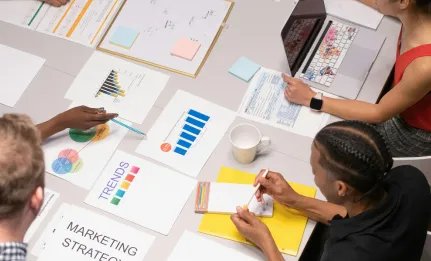 Creative branding team discussing brand identity strategy for business growth