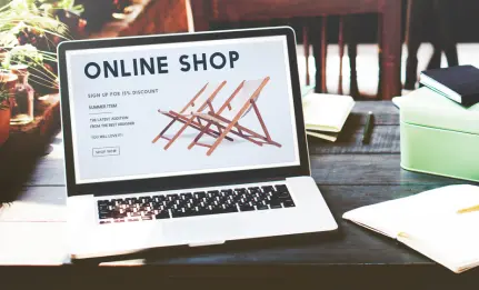 E-commerce website development and online shopping store on laptop