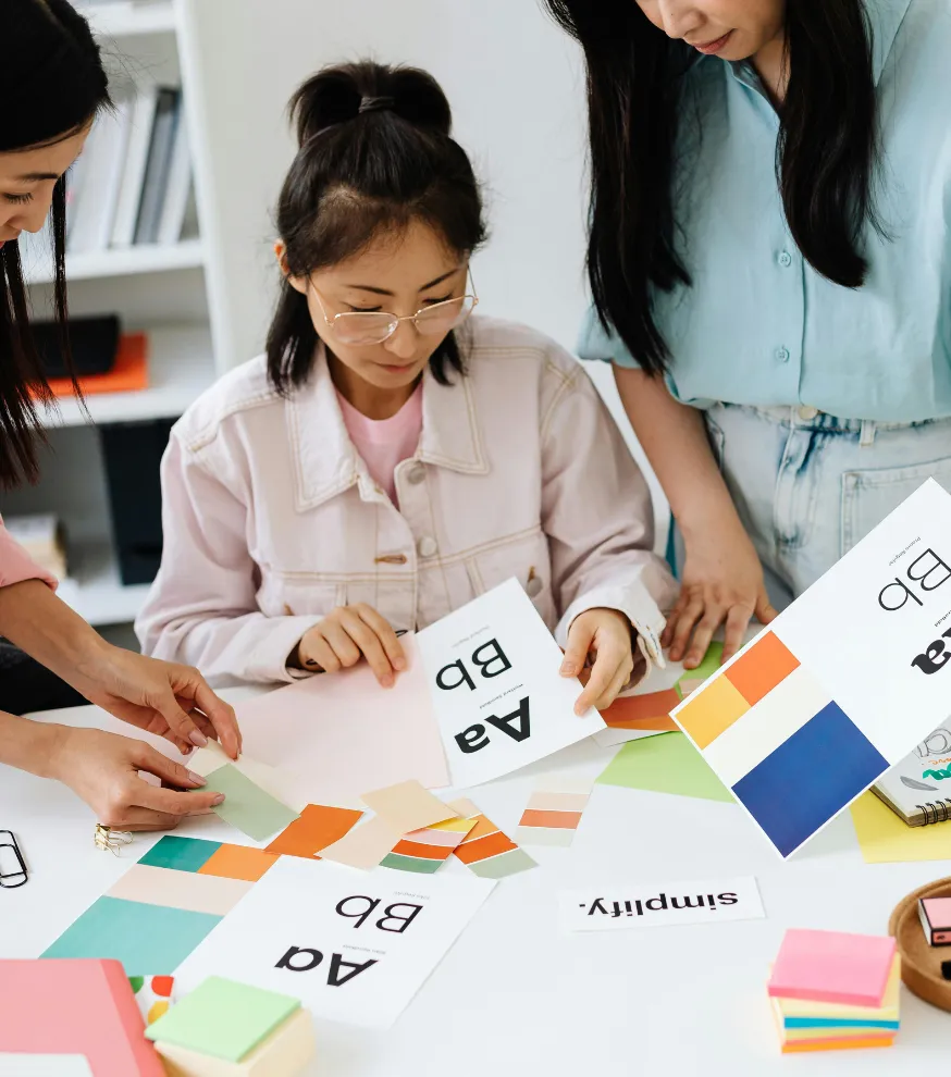 Creative designers working on corporate brand identity in office