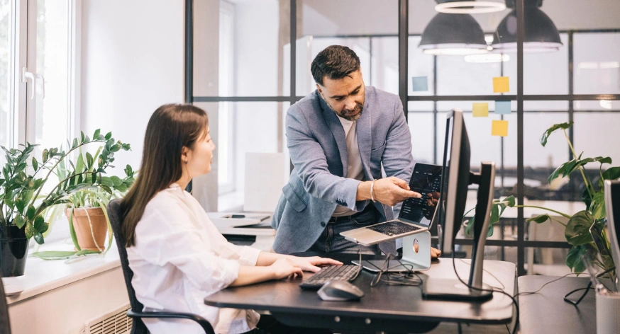 Business professionals analyzing operational performance data