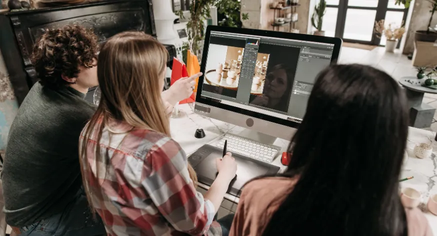 Digital marketing and graphic design team working on visual branding projects